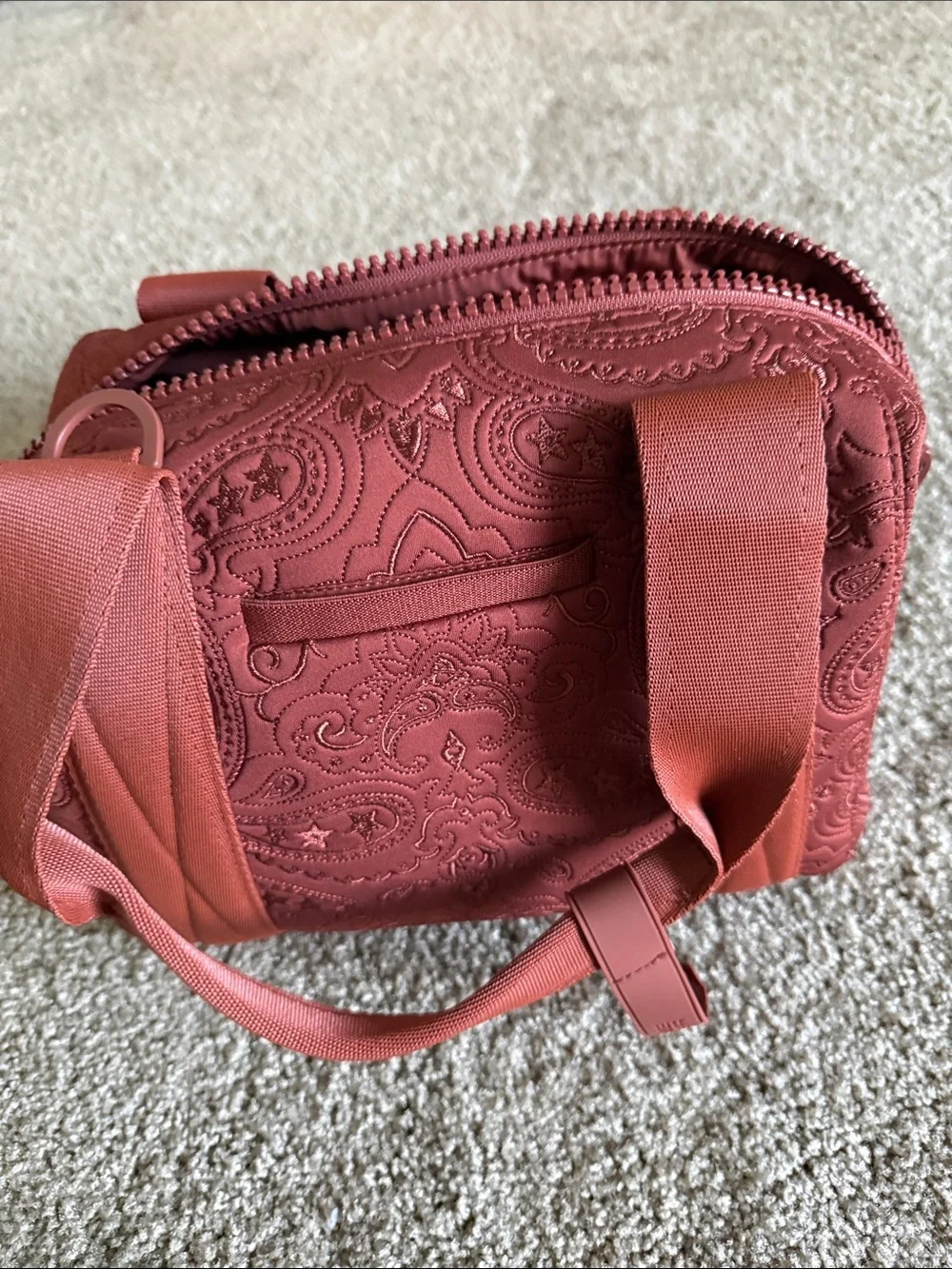 Dagne Dover Paisley Embossed Cosmetic Bag in Rust